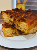 Sticky pecan sourdough focaccia, sliced to show the soft crumb